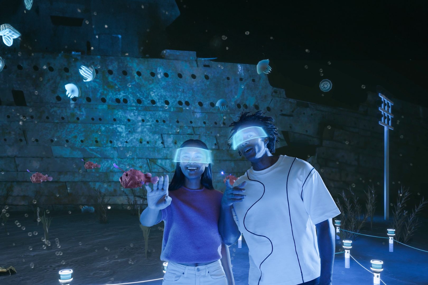 A couple exploring the Titanic's wreckage thanks to virtual reality technology