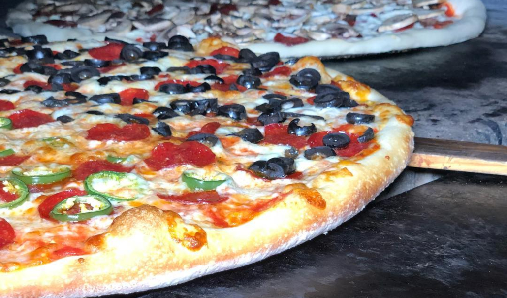 The Top 4 Pizza Shops In Lower Manhattan For Your Late Night Drunchies