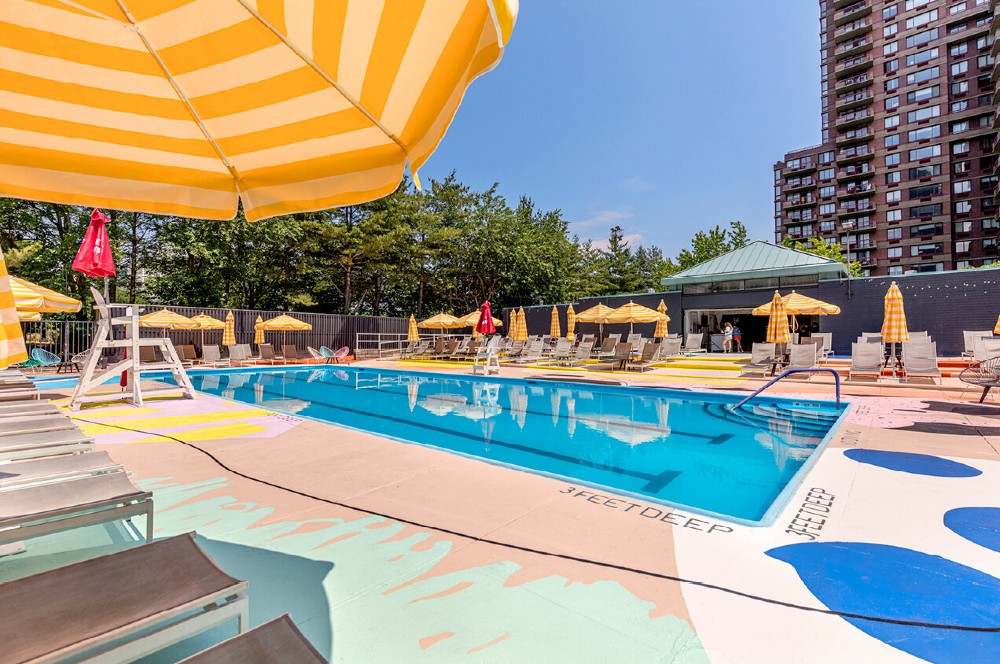 Roosevelt Island's CandyColored Waterfront Pool Reopens For The Summer