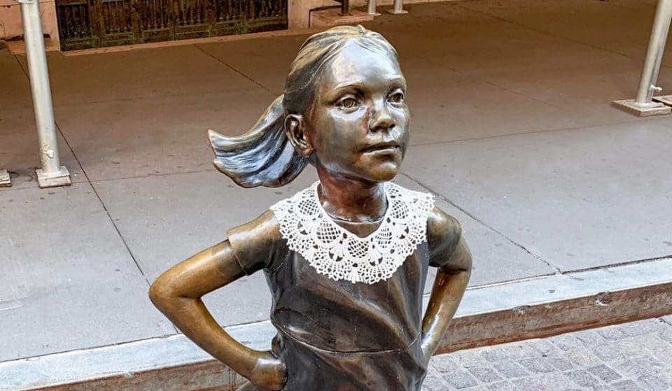 A Lace Collar Has Appeared On Wall Street’s Fearless Girl Statue As A Way To Honor RBG