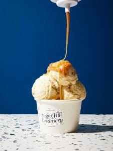 Cup of ice cream scoops