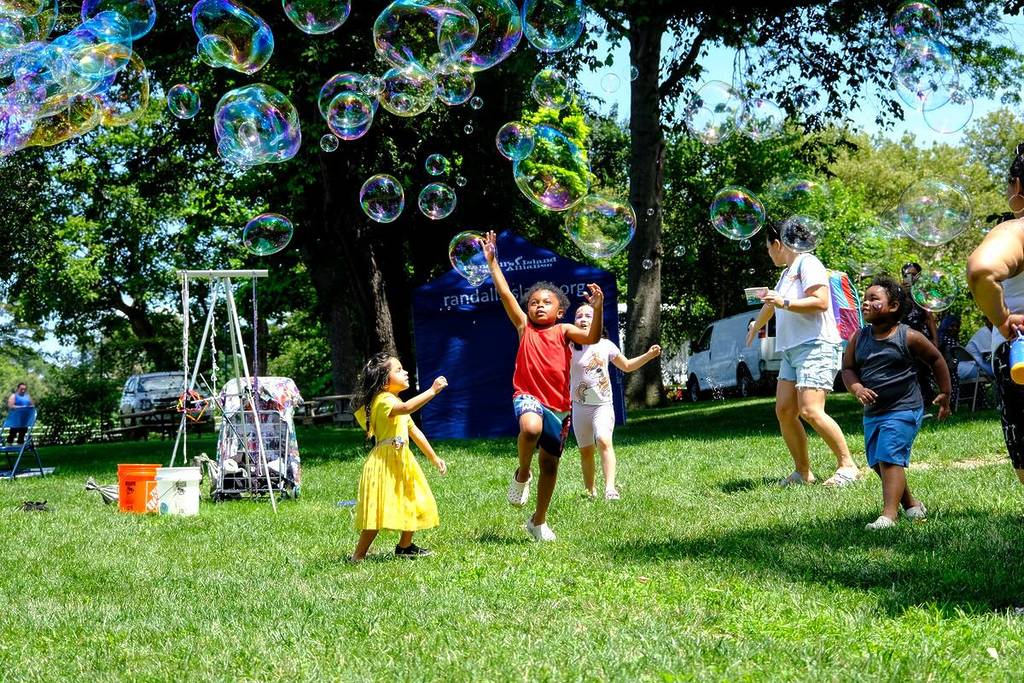 Children playing outside at Randall's Island