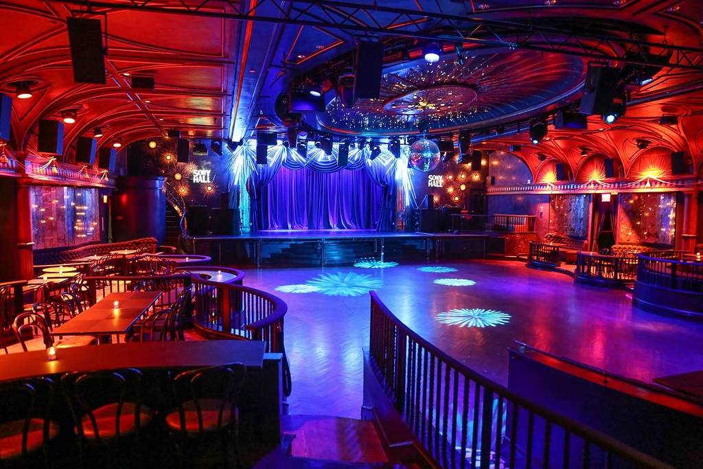 Wide shot of the stage at Sony Hall illuminated for a show