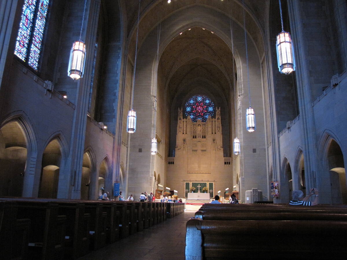 image of old church with light coming in stain glass windows