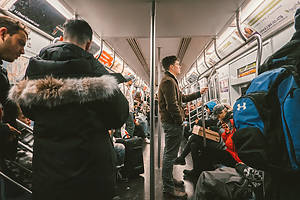 People riding the NYC subway