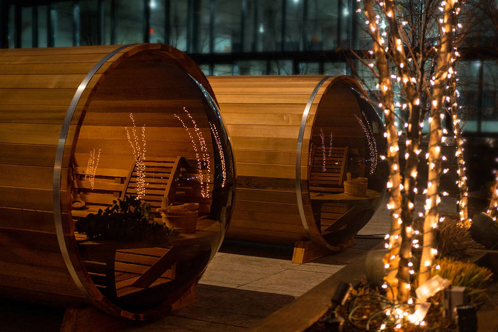 Saunas with Holiday lights on William Vale's rooftop with pop-up.