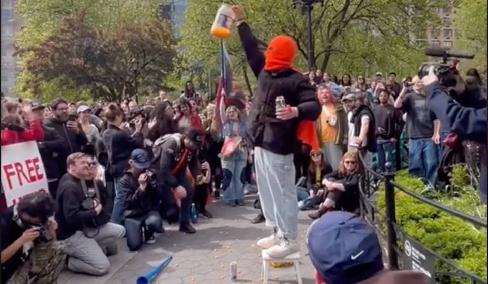 Hundreds Gathered To Watch A Masked Man Eat An Entire Tub Of Cheeseballs In Union Square