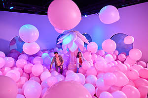 Room filled with giant balloons at the Bubble Planet experience near NYC