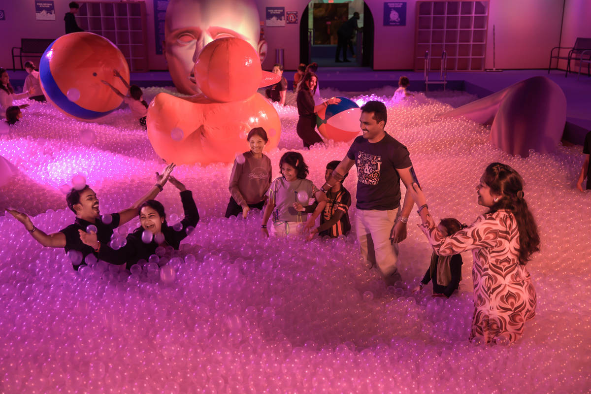A family in the massive ball pit at Bubble Planet near NYC