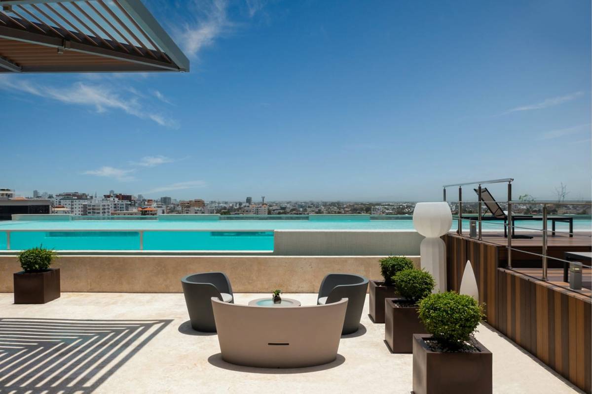 JW Mariott Santa Domingo terrace with a pool