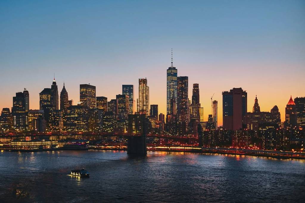 NYC skyline lit up at night