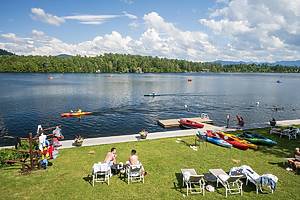 Lake Placid, USA - July 6, 2024. People enjoying their Summer time at Mirror Lake, Lake Placid, New York, USA