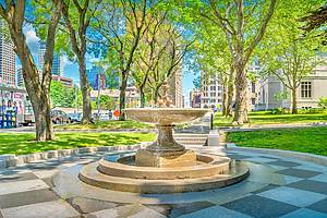 Samll fountain at the city hall in downtown Hartford, Connecticut, USA on a sunny day.