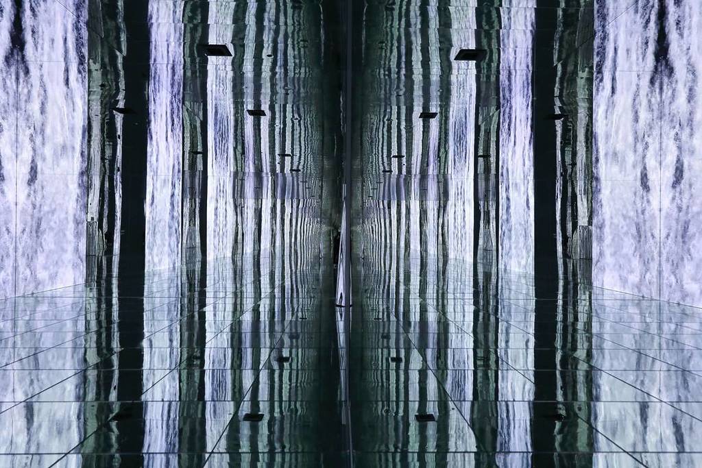 The towering digital waterfall, WATERFALL INFINITE at Arte Museum New York at Chelsea Piers