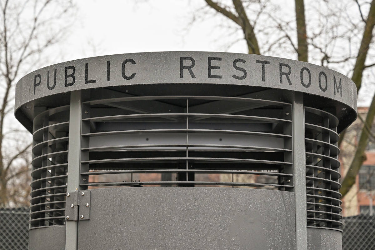 Public restroom sign on Portland Loo in NYC
