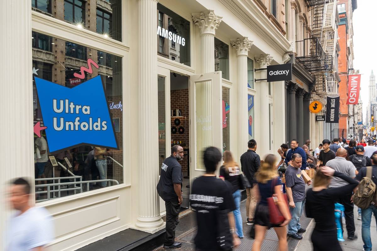 People line up outside the Galaxy Experience Space in SoHo