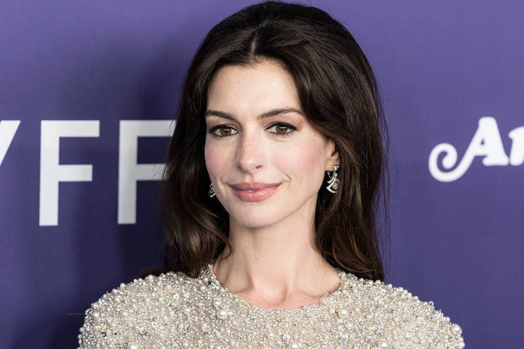 Anne Hathaway wearing dress and shoes by Valentino attends presentation of movie Armageddon Time during 60th New York Film Festival at Alice Tully Hall on October 12, 2022