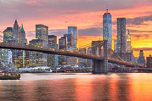 New York, New York, USA Lower Manhattan skyline on the East River at dusk.