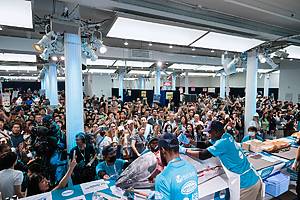 Tuna cutting demonstration with massive crowd at Sushi-Con