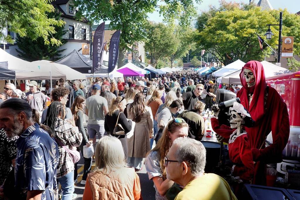SLEEPY HOLLOW, NEW YORK-OCTOBER 5, 2024: People crowd the streets of a Halloween street fair in Sleepy Hollow, NY.