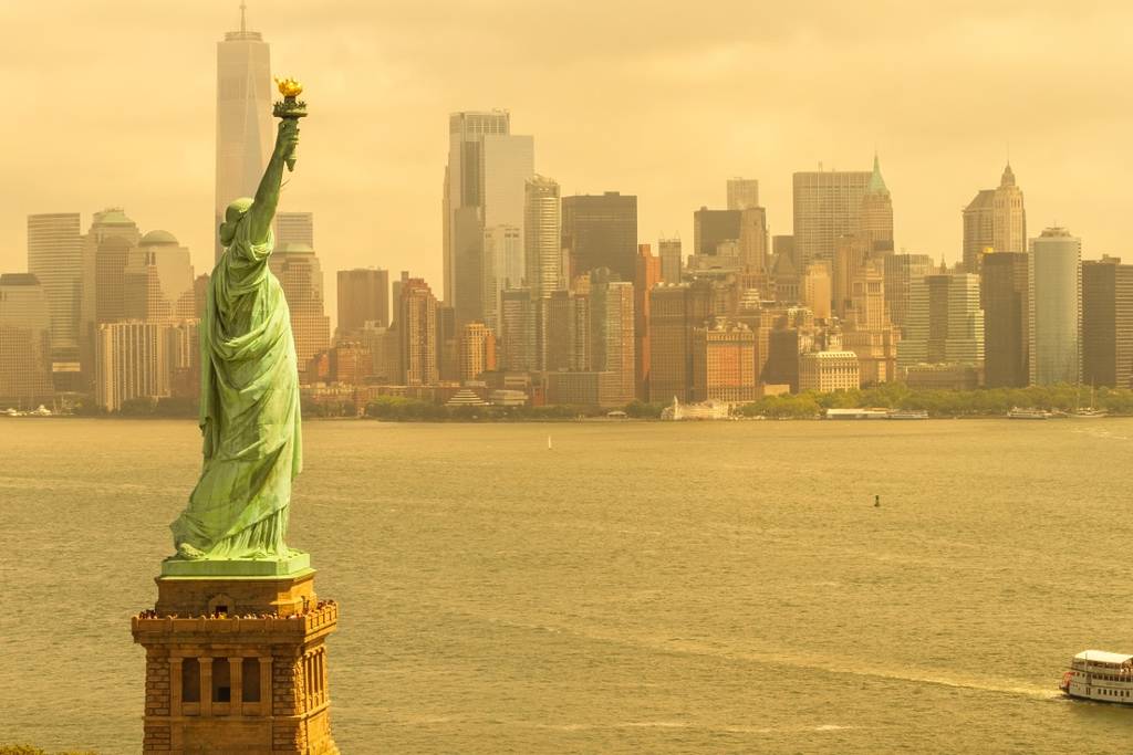 Smog over Statue of Liberty and Lower Manhattan