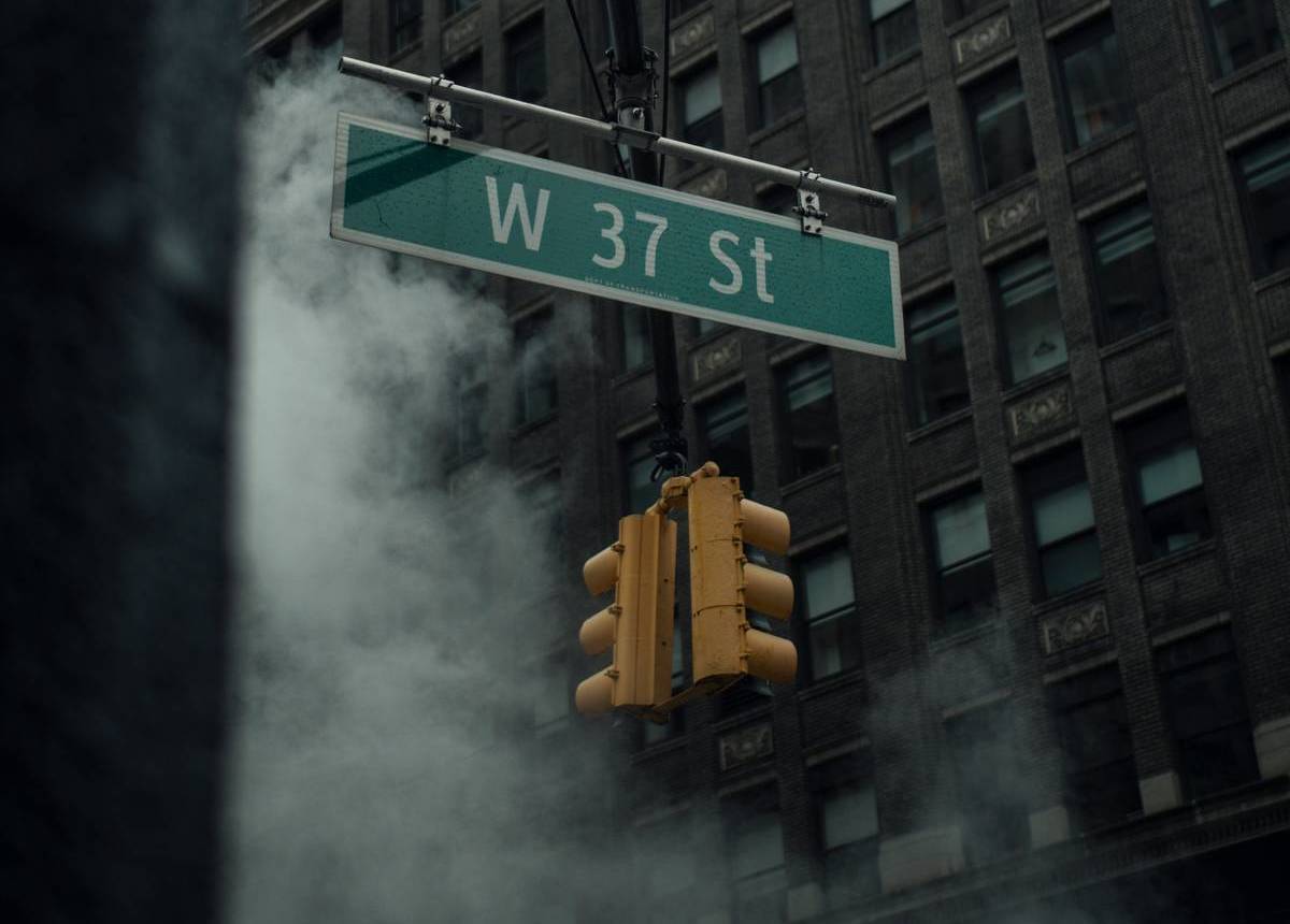 Smog over NYC street sign