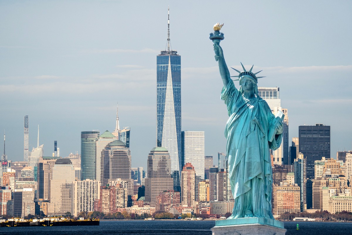 Statue of Liberty with NYC skyline in the background