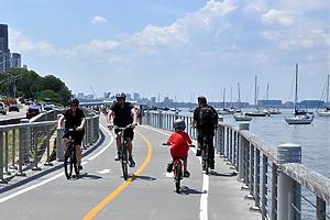 Bicyclists enjoy a summer afternoon on the Hudson River bike path sandwiched between the Hudson River and the Miller Highway (Router 9) on the west side of Manhattan