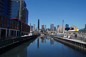 Brooklyn, New York, USA - June 1, 2024: View of the Gowanus Canal and the Brooklyn skyline