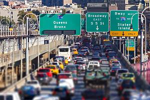 Rush hour traffic jam on the Williamsburg Bridge in Brooklyn, New York City blurred background