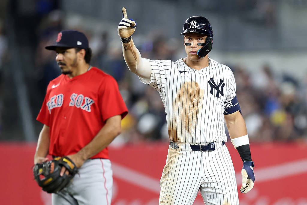 NEW YORK, NEW YORK - JUNE 06: Aaron Judge #99 of the New York Yankees reacts after advancing to second base after an RBI single against the Boston Red Sox during the fifth inning at Yankee Stadium on June 06, 2025 in the Bronx borough of New York City. (Photo by Luke Hales/Getty Images)