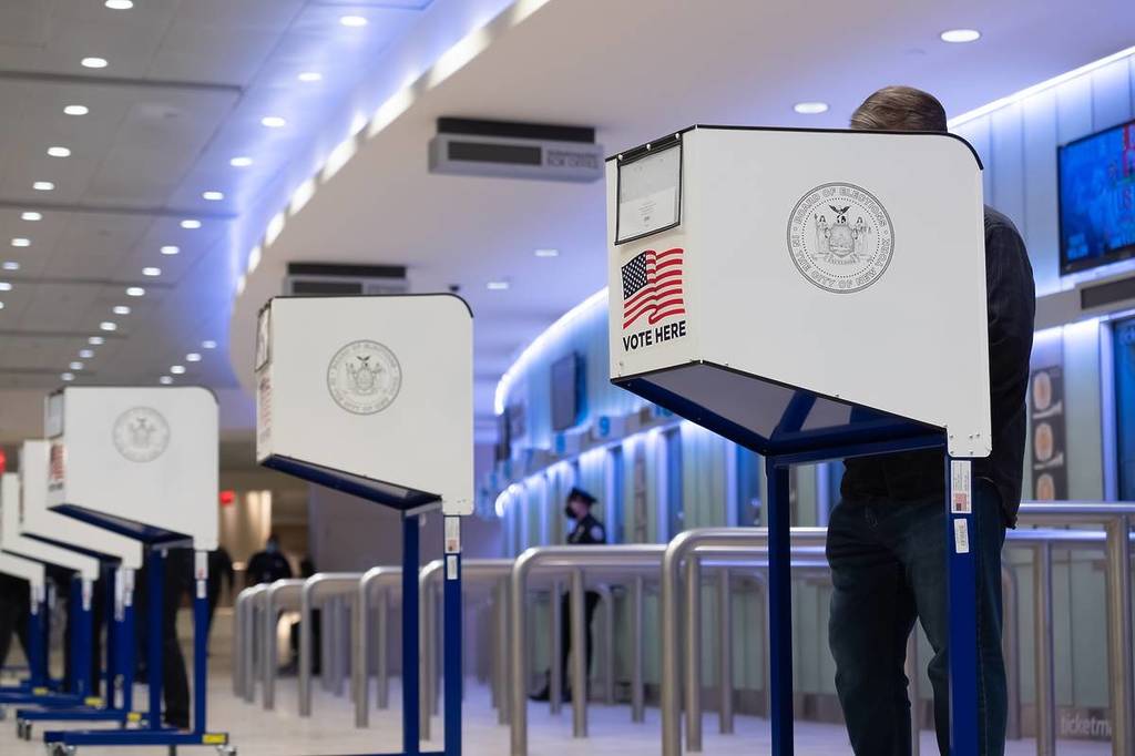 NEW YORK, NEW YORK - OCTOBER 28, 2020: People vote in the Madison Square Garden during the 2020 Presidential election between President Donald J. Trump and Joe Biden.