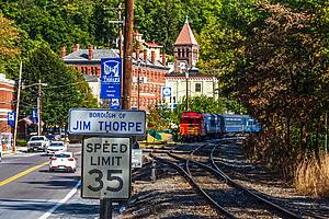 JIM THORPE, PENNSYLVANIA, - SEPTEMBER 28: Railroad tracks along Route 209 lead into Scenic Jim Thorpe on September 28 2016 in Pennsylvania.