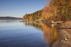 Autumn along the shore of Schroon Lake in New York State basks in the late day sun.