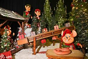 Performers wear holiday costumes