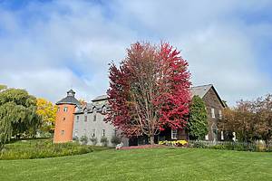 Mackenzie Childs Barn in Aurora with blazing fall foliage