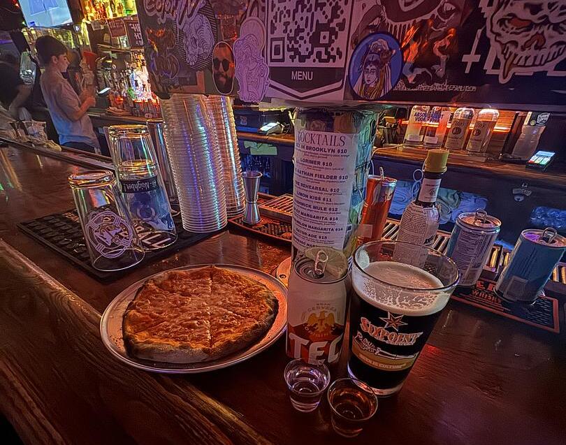 Pizza & drink from The Alligator Lounge in Brooklyn, NYC