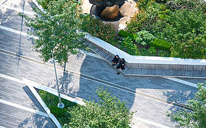 People enjoying Liberty Park at the World Trade Center in New York City