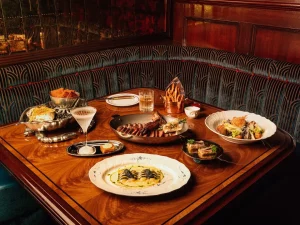 various food and drinks on a table at The Eighty Six