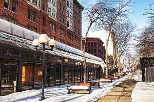 SYRACUSE, UNITED STATES - Jun 16, 2021: East Genesee Street in downtown Syracuse, New York between the SA K Building and the State Tower Building