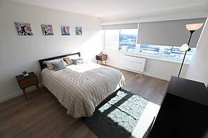bedroom inside the Baisley Pond Park Residences