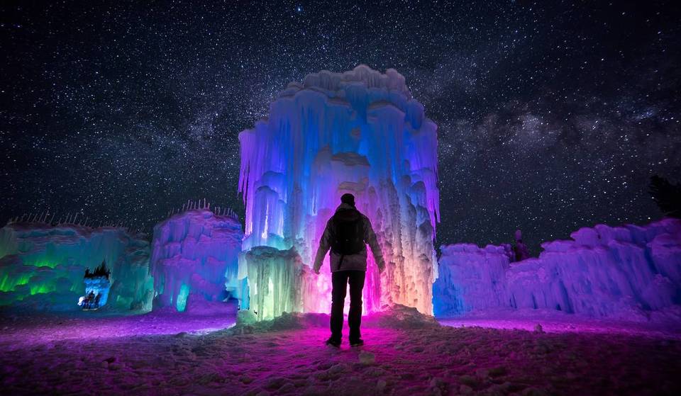 This Otherworldly ‘Frozen’ Kingdom Is One Of The Best Winter Escapes in the U.S. — With Aurora-Like Caverns, An Ice Bar, & A Mystic Light Walk