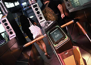 MTA Chair & CEO Janno Lieber, Acting Chief Customer Officer Shanifah Rieara, and Assembly Member Catalina Cruz at the Roosevelt Av-Jackson Heights station on Wednesday, Jul 26, 2023 to commemorate the one billionth tap of the OMNY fare payment system. Candida Alfonso was identified as the lucky customer.