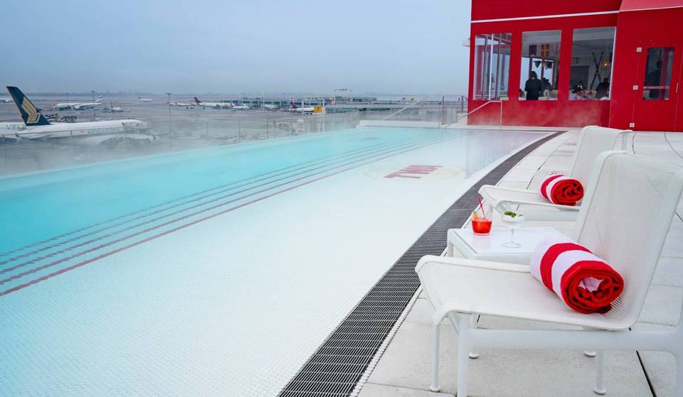 The ‘Best Airport Hotel In North America’ Is Hiding A Year-Round Heated Pool On Its Rooftop—And It’s Right Here In NYC