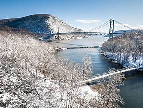 A Snowy New York River Town Is One of The Coziest Small Towns in the U.S. for a Winter Weekend Getaway