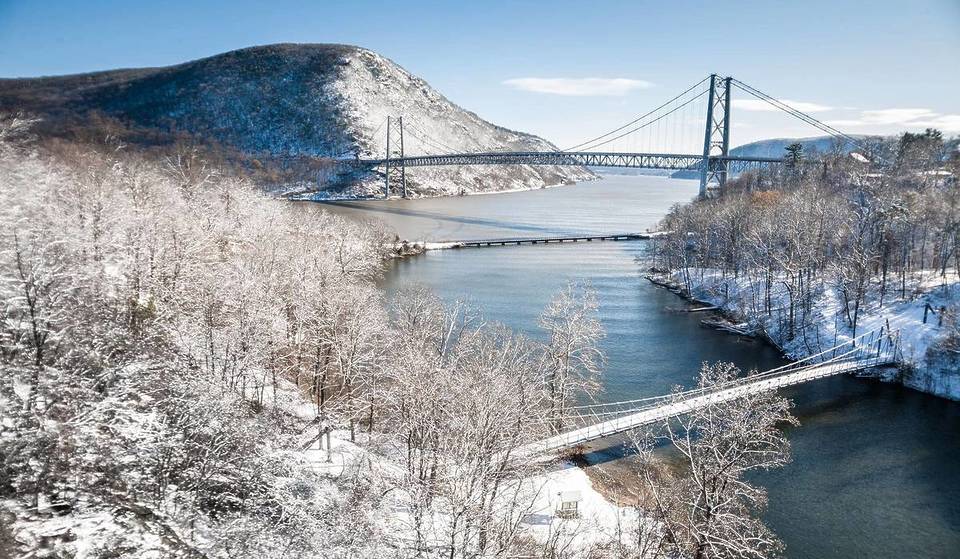 A Snowy New York River Town Is One of The Coziest Small Towns in the U.S. for a Winter Weekend Getaway
