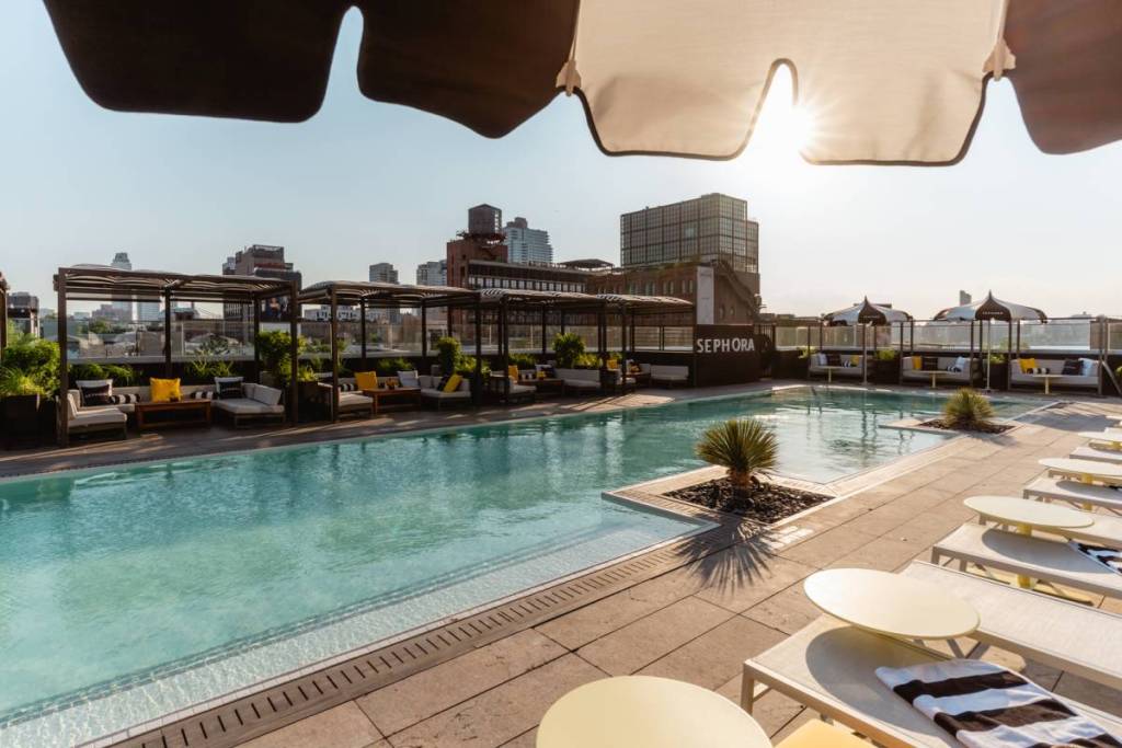 Pool at The William Vale Spa in Brooklyn, with seating and Sephora branding.