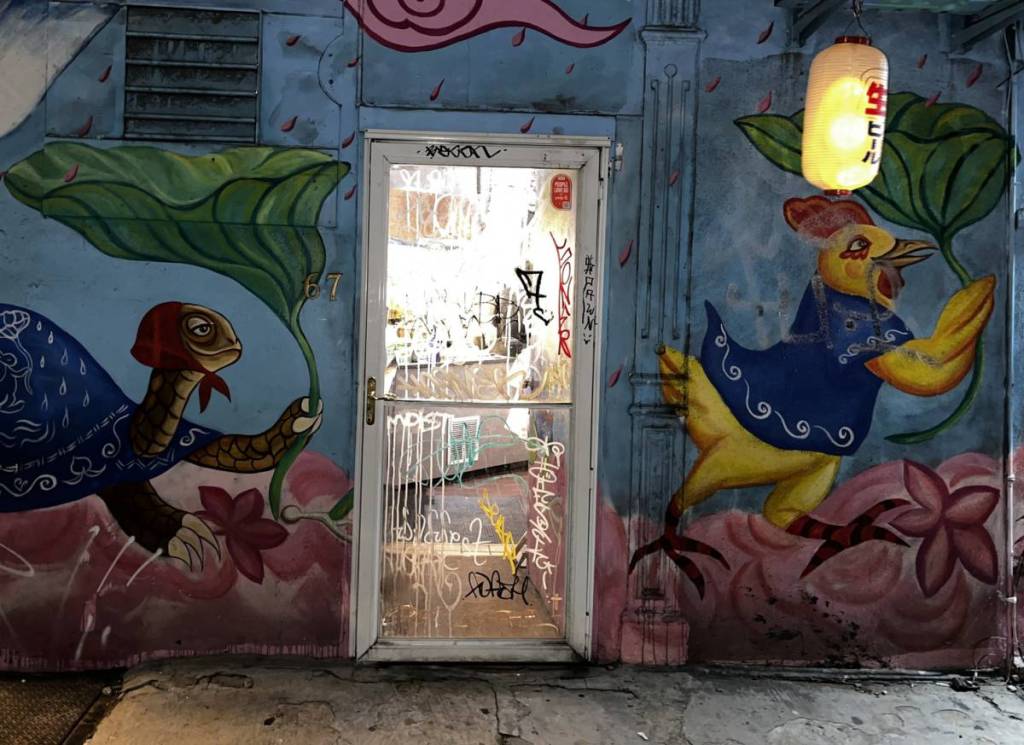 Entrance to BATSU with lantern and mural.