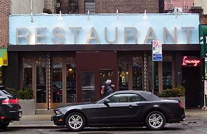 Elmo Restaurant and Lounge at 156 Seventh Avenue between West 19th and 20th Streets in the Chelsea neighborhood of Manhattan, New York City