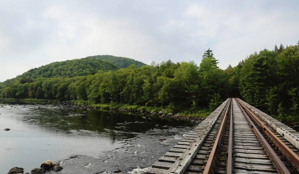 Forget Hiking: This Tiny Adirondack Town Lets You ‘Pedal On Water’ Over The Hudson River Via A 90-Foot Trestle Bridge